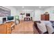 Open-concept living area featuring hardwood floors and seamless flow to the dining room at 705 Stewart Nw Cir, Marietta, GA 30064