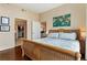 This modern bedroom features hardwood floors and natural lighting at 1080 Peachtree Ne St # 3213, Atlanta, GA 30309