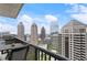 Stunning panoramic city views from the balcony, highlighting iconic skyscrapers under a clear sky at 1080 Peachtree Ne St # 3213, Atlanta, GA 30309