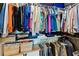 Organized walk-in closet with shelves, hanging rods, and storage baskets for clothes and accessories at 1080 Peachtree Ne St # 3213, Atlanta, GA 30309