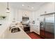 Well-lit kitchen boasts white cabinets, stainless steel appliances, and a functional layout for cooking and entertaining at 1080 Peachtree Ne St # 3213, Atlanta, GA 30309
