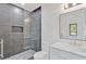 Bathroom featuring vanity with stone countertop and sleek walk in shower at 115 Nova Ln, Roswell, GA 30075