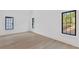 Bedroom with hardwood floors, and bright windows at 115 Nova Ln, Roswell, GA 30075