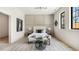 Cozy bedroom featuring a luxurious bed, decorative accents, and ample natural light at 115 Nova Ln, Roswell, GA 30075