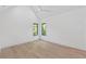 Bedroom with hardwood floors, and bright windows at 115 Nova Ln, Roswell, GA 30075