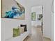 Bright entryway features neutral decor, white trim, and a large framed print at 115 Nova Ln, Roswell, GA 30075
