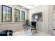 Bright office space with large windows, modern desk, comfortable chairs, and stylish decor at 115 Nova Ln, Roswell, GA 30075