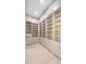 Spacious pantry featuring floor to ceiling built-in cabinets and shelving at 115 Nova Ln, Roswell, GA 30075