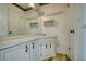 Clean white bathroom with decorative mirror and sink and vanity at 177 Fairview Dr, Fairburn, GA 30213