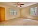 Bright bedroom with plush carpet and generous natural light at 177 Fairview Dr, Fairburn, GA 30213