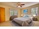 Comfortable bedroom with windows that offer natural light and calming decor at 177 Fairview Dr, Fairburn, GA 30213