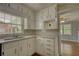 Updated kitchen featuring white cabinets, marble countertops and stainless steel appliances at 177 Fairview Dr, Fairburn, GA 30213