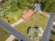 An aerial view of a single-story home featuring a sprawling lawn and lush landscaping in a peaceful neighborhood at 4927 Bedell Ne Rd, Roswell, GA 30075