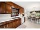 Functional kitchen featuring ample counter space, with adjacent dining area at 4927 Bedell Ne Rd, Roswell, GA 30075
