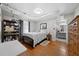 Cozy bedroom with hardwood floors, access lift, and serene decor at 5839 Darry Cir, Norcross, GA 30093