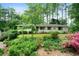 Charming single-story home with a landscaped front yard and mature trees offering plenty of shade at 5839 Darry Cir, Norcross, GA 30093