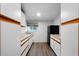 Eat-in kitchen with black refrigerator, wood-look floors, and sink at 5839 Darry Cir, Norcross, GA 30093