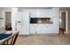 Bright kitchen boasting white cabinets, modern appliances, and ample counter space at 5839 Darry Cir, Norcross, GA 30093