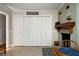Charming kitchen with ample storage, white cabinets and stone fireplace at 5839 Darry Cir, Norcross, GA 30093