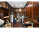 Cozy paneled office space with built-in shelves and wood floors at 5839 Darry Cir, Norcross, GA 30093