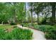 Lush property with towering trees and an inviting walkway at 5839 Darry Cir, Norcross, GA 30093