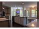 Spacious kitchen with island, granite countertops, stainless steel appliances, and pendant lighting fixture at 610 Big Bend Trl, Sugar Hill, GA 30518