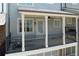 Comfortable balcony with black railing, ceiling fan, and views of the surrounding neighborhood at 6135 Redwine St, Norcross, GA 30071