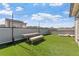 Rooftop deck with outdoor seating and artificial turf perfect for relaxing at 6135 Redwine St, Norcross, GA 30071