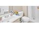Bright bathroom with a white vanity, sink, toilet and shower offers a clean design at 992 Old Holcomb Bridge Rd, Roswell, GA 30076