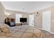 Bedroom showcasing a bed, dresser, a TV, and bathroom entrance at 992 Old Holcomb Bridge Rd, Roswell, GA 30076