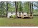 Beautiful home with a wooden deck, fenced backyard and mature trees at 1587 Wainwright Se Dr, Atlanta, GA 30316