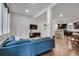 Bright living room featuring hardwood floors, a large window and an open layout with recessed lighting at 1587 Wainwright Se Dr, Atlanta, GA 30316
