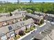 Aerial view of a community of townhomes surrounded by lush greenery at 2775 Loftview Sq # 8, Atlanta, GA 30339