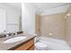 Well-lit bathroom featuring a shower-over-tub, granite counters, and stylish fixtures at 2775 Loftview Sq # 8, Atlanta, GA 30339