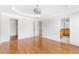 Large bedroom has neutral paint and hardwood floors, with views to the closet and bathroom entrances at 2775 Loftview Sq # 8, Atlanta, GA 30339