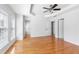Spacious bedroom with hardwood floors, neutral walls, and multiple entrances at 2775 Loftview Sq # 8, Atlanta, GA 30339