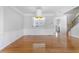 Bright dining area showcasing beautiful hardwood floors and stylish lighting at 2775 Loftview Sq # 8, Atlanta, GA 30339