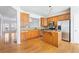 Spacious kitchen featuring stainless steel appliances and center island and hardwood flooring at 2775 Loftview Sq # 8, Atlanta, GA 30339