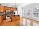 Well-lit kitchen featuring stainless steel appliances, granite countertops, and a center island at 2775 Loftview Sq # 8, Atlanta, GA 30339