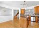 Open concept kitchen with a center island, stainless steel appliances, and natural wood cabinets at 2775 Loftview Sq # 8, Atlanta, GA 30339