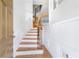 Elegant foyer featuring a curved staircase with hardwood steps and iron spindles at 2775 Loftview Sq # 8, Atlanta, GA 30339