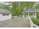 Inviting backyard deck with gazebo amidst lush greenery at 2988 Chipmunk Se Trl, Marietta, GA 30067