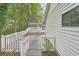 Backyard deck featuring a charming gazebo, surrounded by mature trees at 2988 Chipmunk Se Trl, Marietta, GA 30067