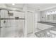 Bathroom featuring glass enclosed shower, granite counters, double sinks, and white cabinets at 2988 Chipmunk Se Trl, Marietta, GA 30067