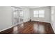 Cozy bedroom with hardwood floors and a window, providing a comfortable and naturally lit space at 2988 Chipmunk Se Trl, Marietta, GA 30067