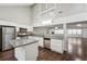 Modern kitchen with stainless steel appliances, granite countertops, an island, and hardwood floors at 2988 Chipmunk Se Trl, Marietta, GA 30067