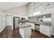 Modern kitchen features stainless steel appliances, granite countertops, and hardwood flooring throughout at 2988 Chipmunk Se Trl, Marietta, GA 30067