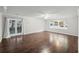 Spacious living room with hardwood floors, natural light, and a ceiling fan at 2988 Chipmunk Se Trl, Marietta, GA 30067