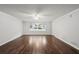 Bright living room featuring hardwood floors, large windows, and neutral colors at 2988 Chipmunk Se Trl, Marietta, GA 30067
