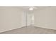 A view of a bedroom featuring carpet with plastic covering, two closets and neutral paint at 625 Lorimore Pass, Canton, GA 30115